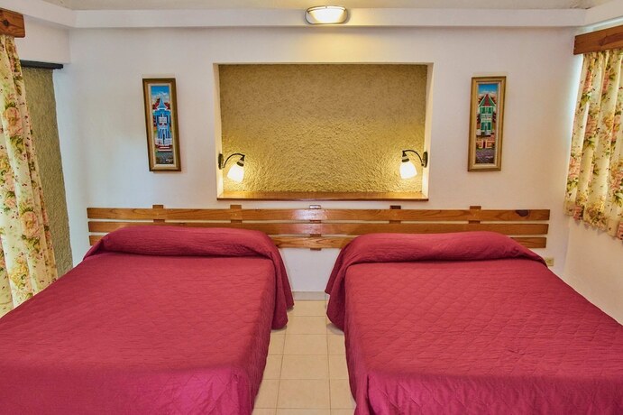 Imagen de la habitación del Hotel Visa Lodge. Foto 18