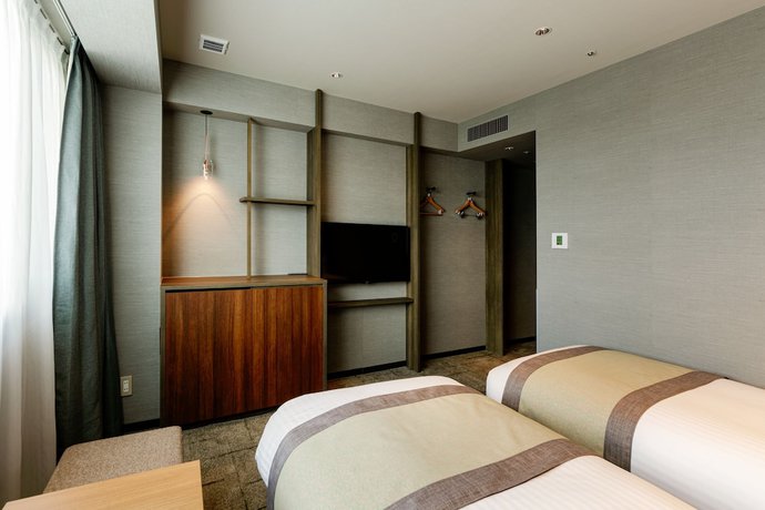 Imagen de la habitación del Hotel Vischio Toyama By Granvia. Foto 8