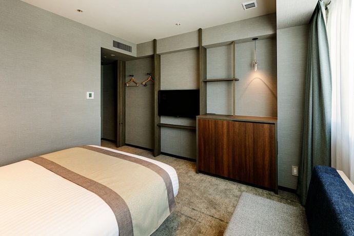 Imagen de la habitación del Hotel Vischio Toyama By Granvia. Foto 14