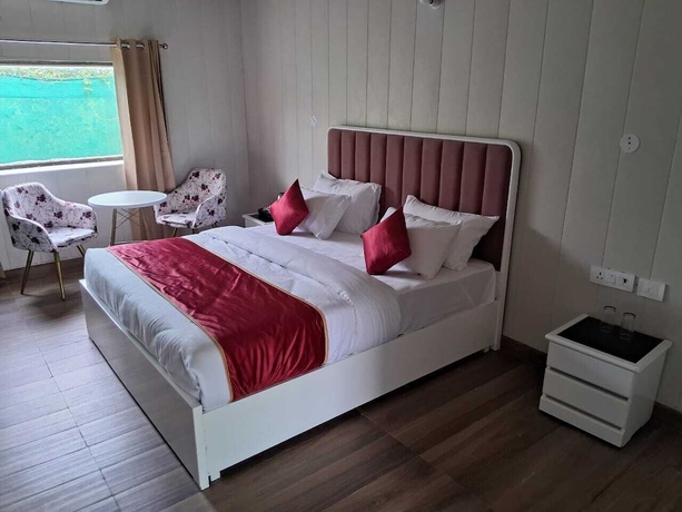 Imagen de la habitación del Hotel Vishalgarh Farms. Foto 15