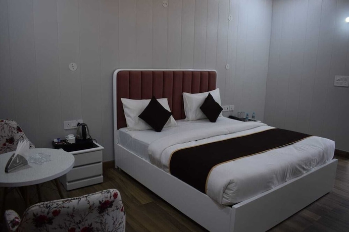 Imagen de la habitación del Hotel Vishalgarh Farms. Foto 16