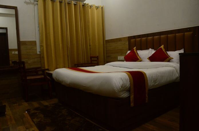 Imagen de la habitación del Hotel Vishnu Lok. Foto 19