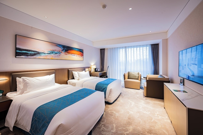Imagen de la habitación del Hotel Vision Plaza Shahe Intl. Cultural Center. Foto 8
