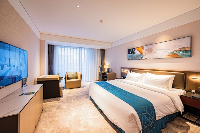 Imagen de la habitación del Hotel Vision Plaza Shahe Intl. Cultural Center. Foto 9