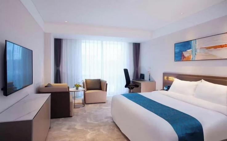 Imagen de la habitación del Hotel Vision Plaza Shahe Intl. Cultural Center. Foto 10