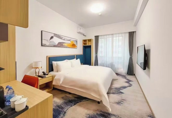 Imagen de la habitación del Hotel Vision Plaza Shahe Intl. Cultural Center. Foto 11