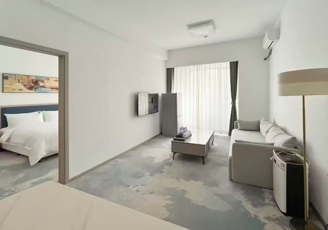 Imagen de la habitación del Hotel Vision Plaza Shahe Intl. Cultural Center. Foto 14
