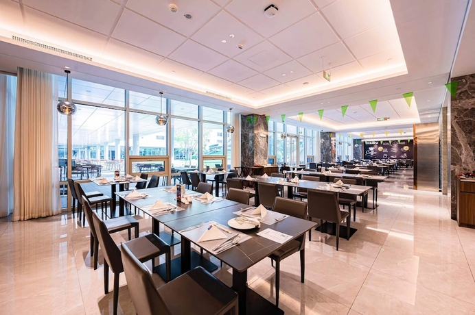 Imagen del bar/restaurante del Hotel Vision Plaza Shahe Intl. Cultural Center. Foto 5