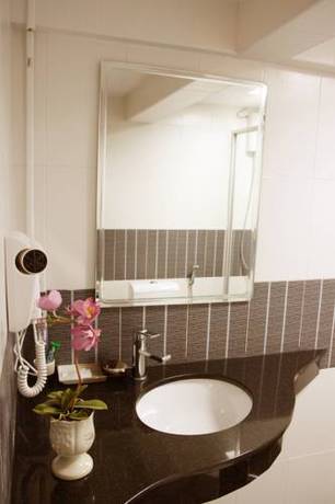 Imagen de la habitación del Hotel Visiting Card and Resort. Foto 5