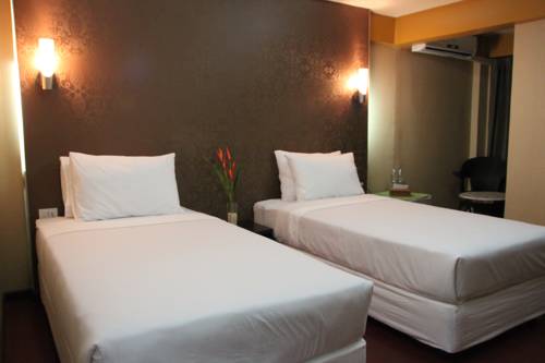 Imagen de la habitación del Hotel Visiting Card and Resort. Foto 7