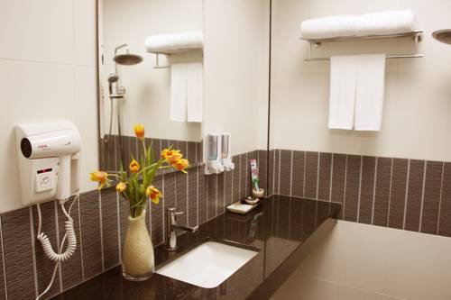 Imagen de la habitación del Hotel Visiting Card and Resort. Foto 8