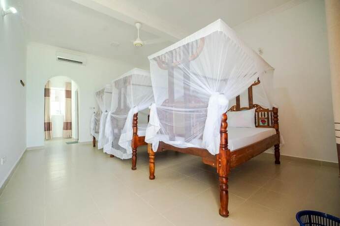 Imagen de la habitación del Hotel Visitors Inn Jambiani. Foto 7