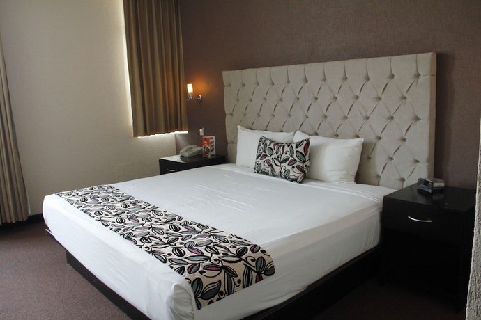 Imagen de la habitación del Hotel Vista Inn Premium. Foto 4