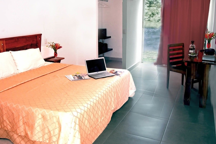 Imagen de la habitación del Hotel Vista Lago Ecoresort. Foto 5