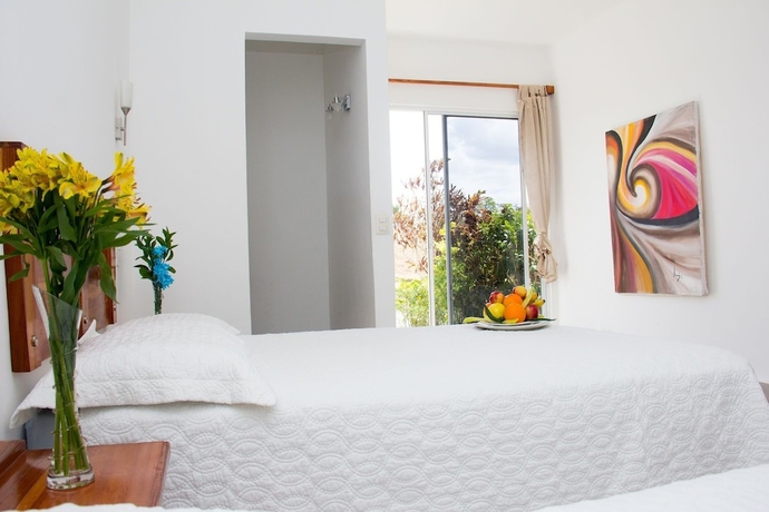 Imagen de la habitación del Hotel Vista Lago Ecoresort. Foto 8