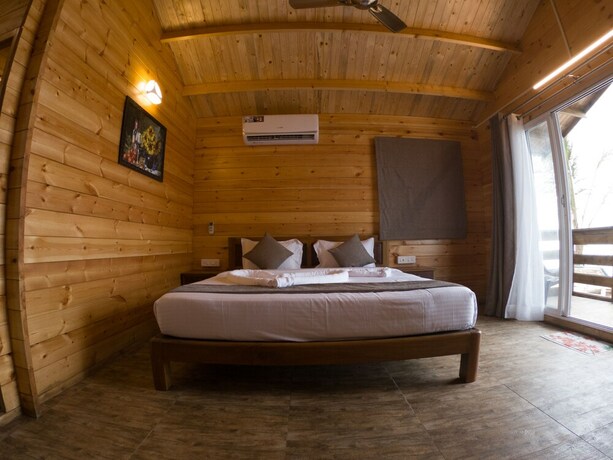 Imagen de la habitación del Hotel Vista Praia Beachfront Cottages. Foto 18