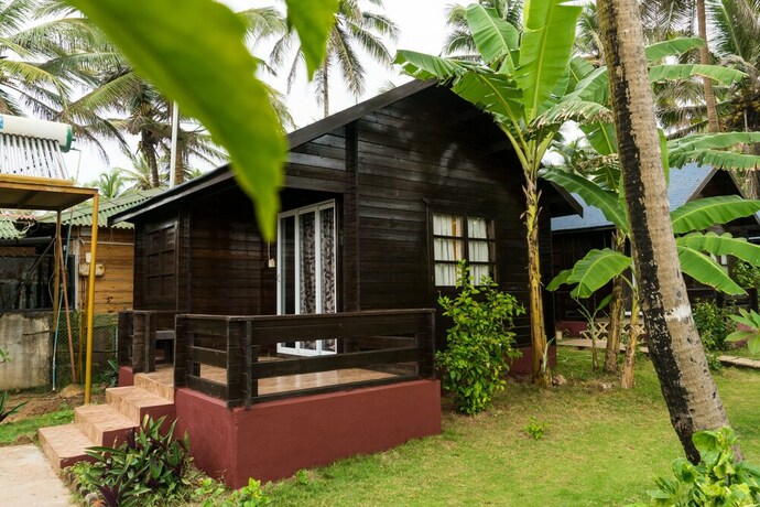 Imagen de la habitación del Hotel Vista Praia Beachfront Cottages. Foto 25