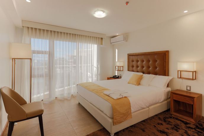 Imagen de la habitación del Hotel Vista Quince. Foto 17