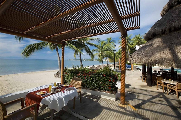 Imagen del bar/restaurante del Hotel Vista Vallarta All Suites On The Beach. Foto 6