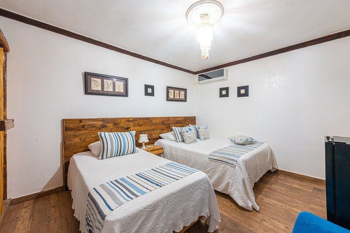 Imagen de la habitación del Hotel Vista de Aguilas Ecolodge. Foto 9