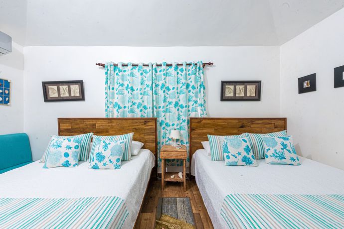Imagen de la habitación del Hotel Vista de Aguilas Ecolodge. Foto 11