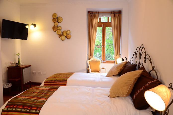 Imagen de la habitación del Hotel Vista del Angel Boutique. Foto 17