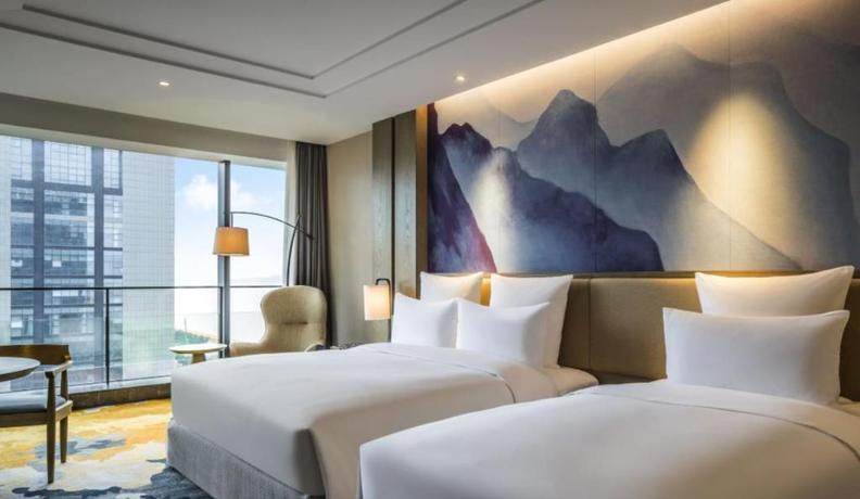 Imagen de la habitación del Hotel Vistas al mar Pullman Zhoushan. Foto 12