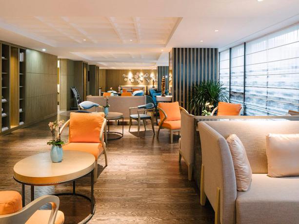 Imagen del bar/restaurante del Hotel Vistas al mar Pullman Zhoushan. Foto 10