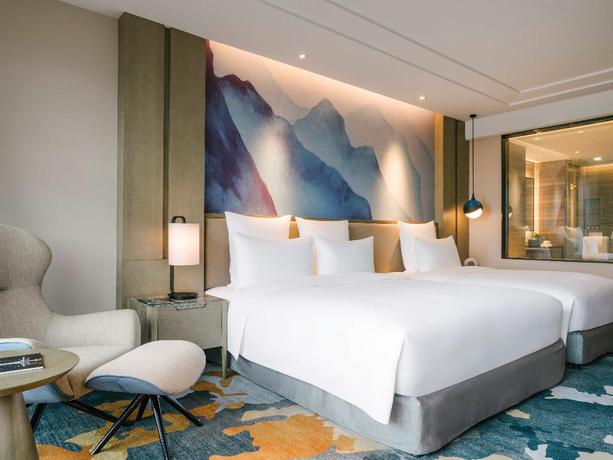 Imagen de la habitación del Hotel Vistas al mar Pullman Zhoushan. Foto 16