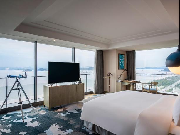 Imagen de la habitación del Hotel Vistas al mar Pullman Zhoushan. Foto 17
