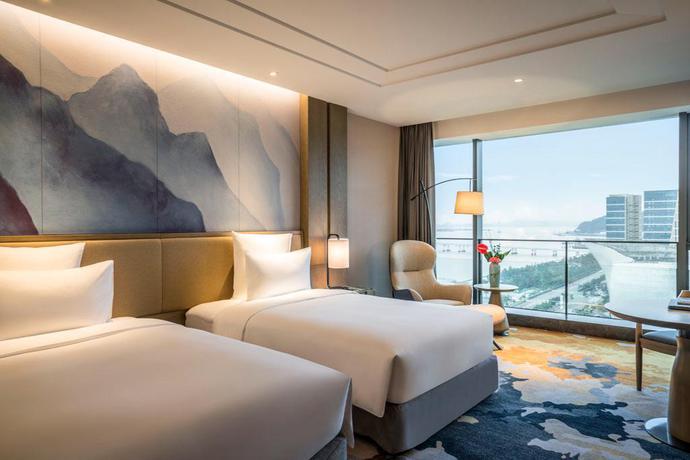 Imagen de la habitación del Hotel Vistas al mar Pullman Zhoushan. Foto 18