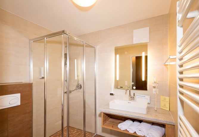 Imagen de la habitación del Hotel Vitaler Landauerhof. Foto 3