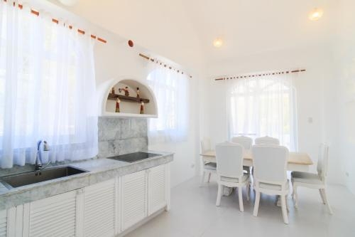 Imagen de la habitación del Hotel Vitalis Villas. Foto 7