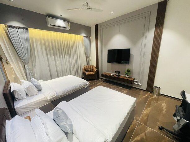 Imagen de la habitación del Hotel Vits Jamnagar. Foto 20