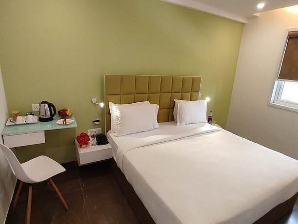 Imagen de la habitación del Hotel Vits Select Rajkot. Foto 19