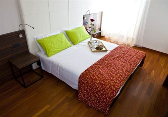 Imagen de la habitación del Hotel Vittorio, Desenzano del Garda. Foto 10