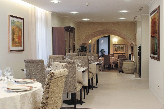 Imagen del bar/restaurante del Hotel Vittorio Emanuele. Foto 4