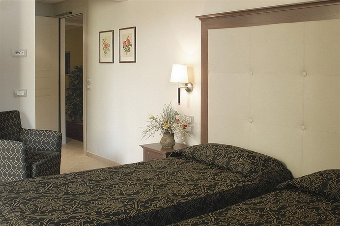 Imagen de la habitación del Hotel Vittorio Emanuele. Foto 9