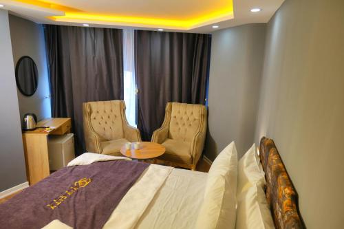 Imagen de la habitación del Hotel Viv City. Foto 20