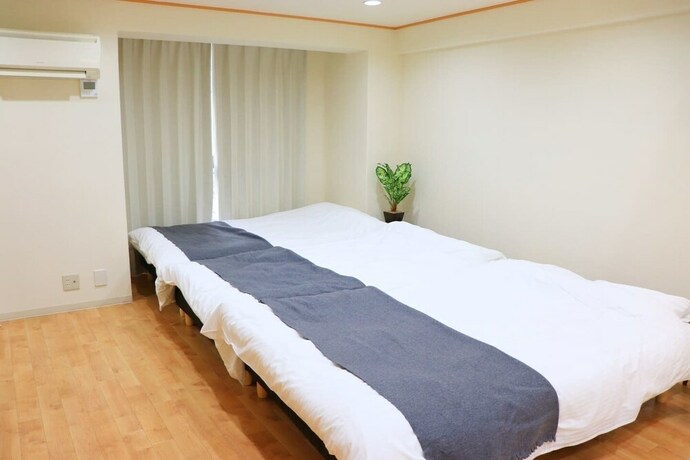 Imagen de la habitación del Hotel Viva Apartment Yabacho (002). Foto 21