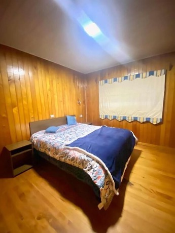 Imagen de la habitación del Hotel Viva Chile Hostal Puerto Varas. Foto 2