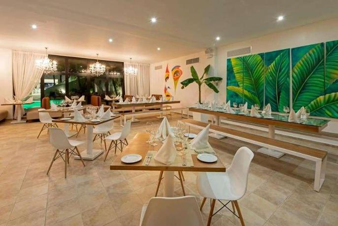 Imagen del bar/restaurante del Hotel Viva Heavens by Wyndham, A Trademark All Inclusive. Foto 9