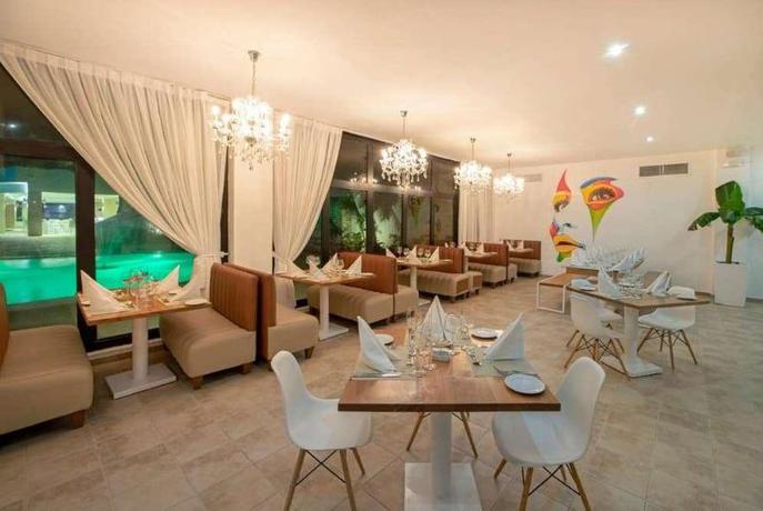 Imagen del bar/restaurante del Hotel Viva Heavens by Wyndham, A Trademark All Inclusive. Foto 10