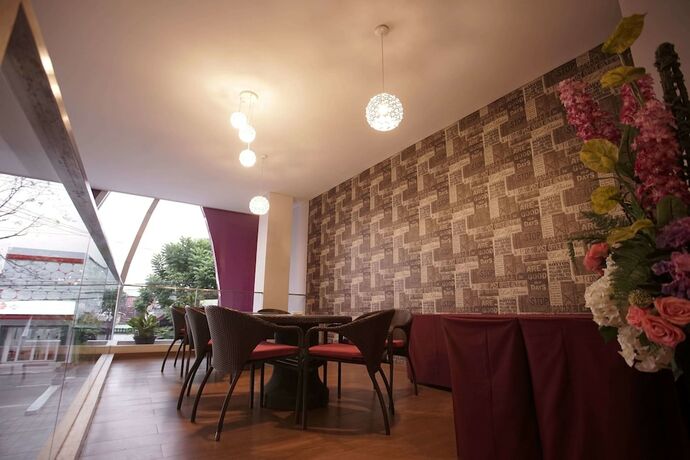 Imagen del bar/restaurante del Hotel Viva Kediri By Front One. Foto 23