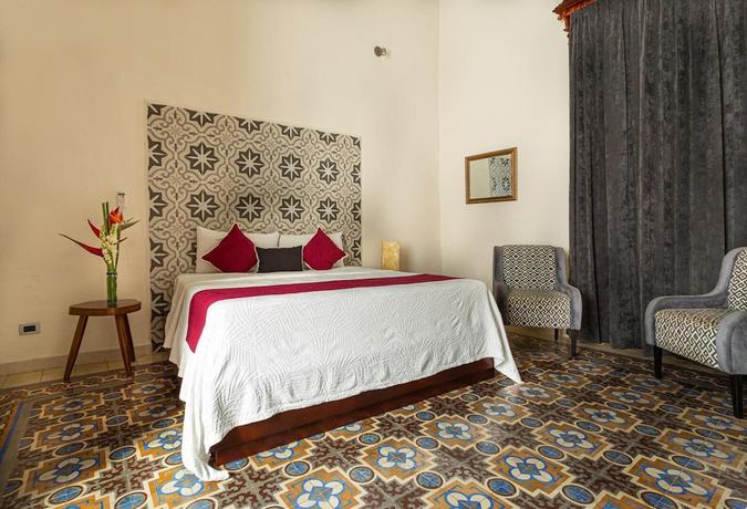 Imagen de la habitación del Hotel Viva Merida Boutique. Foto 9