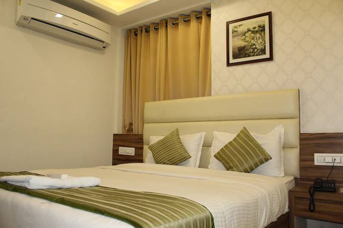Imagen de la habitación del Hotel Vivan, Gandhinagar. Foto 8