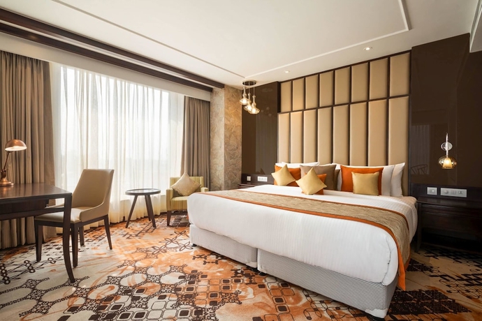 Imagen de la habitación del Hotel Vivanta Jammu City Centre. Foto 7