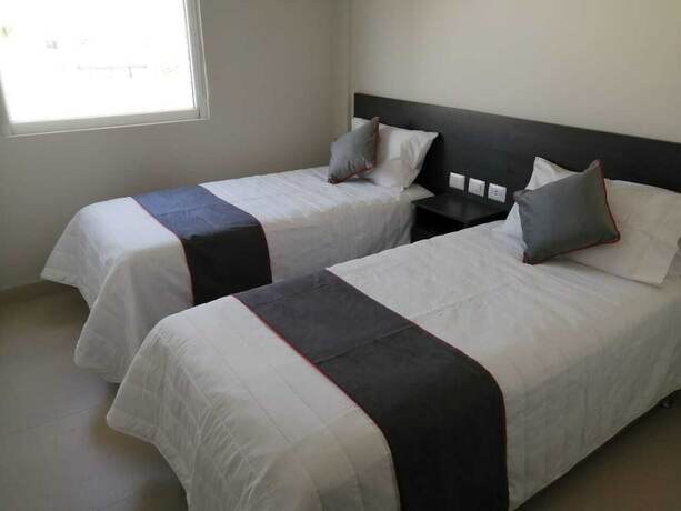 Imagen de la habitación del Hotel Vive Place. Foto 17