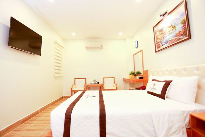 Imagen de la habitación del Hotel Vivian Saigon. Foto 15