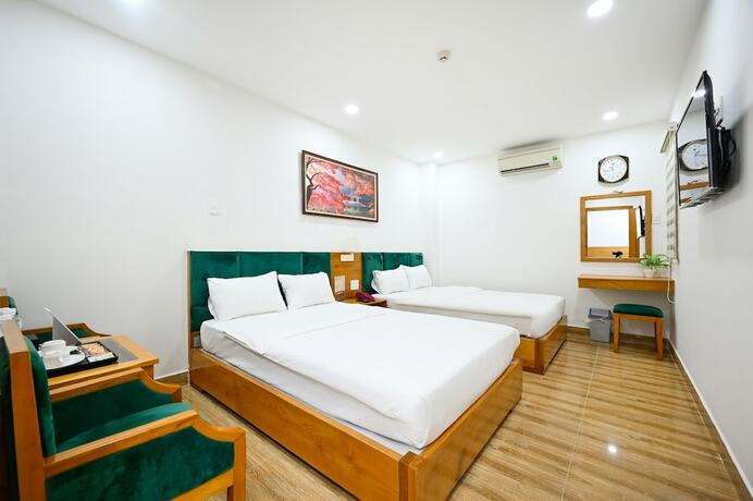 Imagen de la habitación del Hotel Vivian Saigon. Foto 16